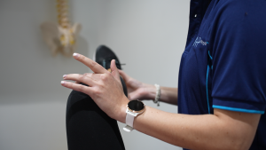 a physio performing sports rehabilitation