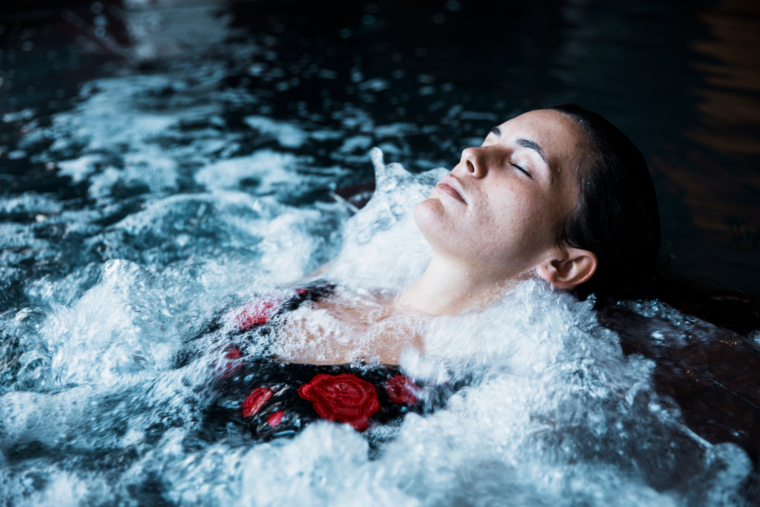 A woman enjoying a hydrotherapy session.